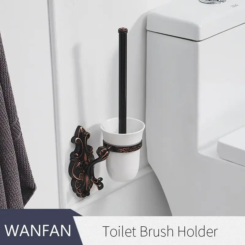 Antique bronze ornate wall-mounted toilet brush holder with white ceramic cup and black handle brush holder set