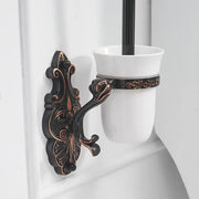 Antique bronze ornate wall-mounted toilet brush holder with a white ceramic cup for bathroom brush holder set