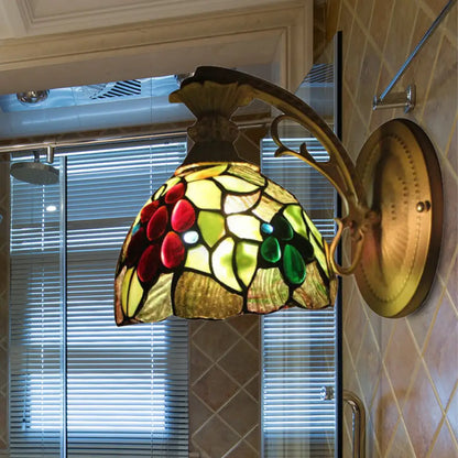 Aplique de pared Tiffany de bronce antiguo con cúpula de cristal verde claro