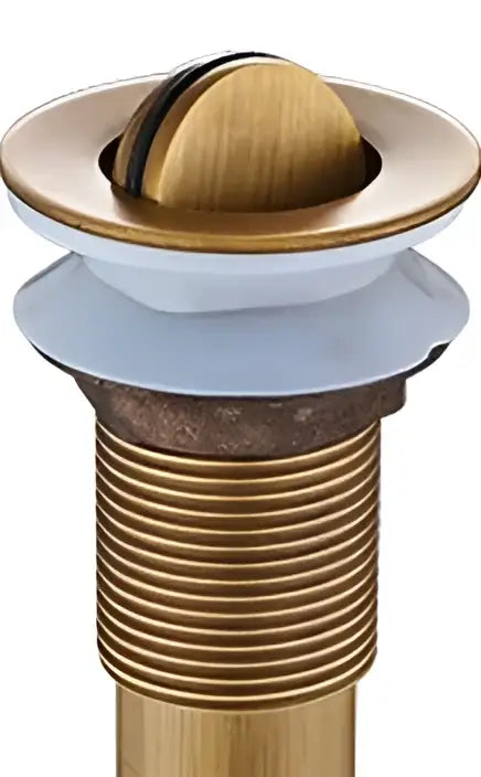 Antique brushed brass pop up sink drain with a rounded domed lid and threaded body by decorbites brass pop