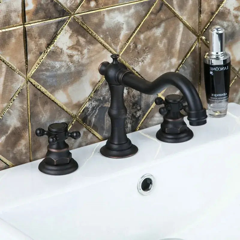 Antique bronze-finished basin faucet with three handles and vintage design for bathroom decorbites dual handle use