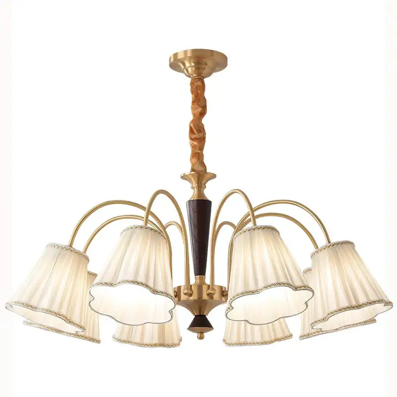 Antique copper chandelier with six cream pleated fabric shades and dark wood accents for dining room lighting