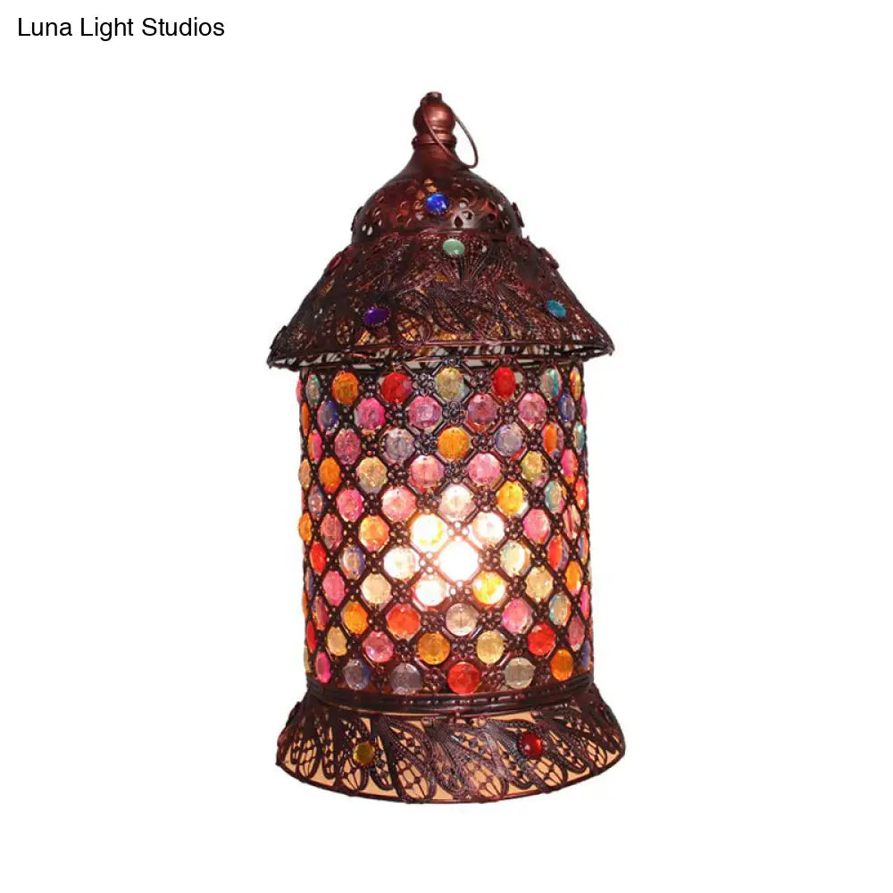 Lámpara de mesilla de noche Pavilion de cobre antiguo: elegante pieza de metal para estudio o mesilla de noche.