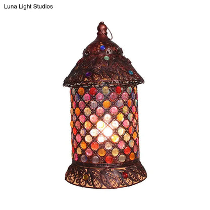 Lámpara de mesilla de noche Pavilion de cobre antiguo: elegante pieza de metal para estudio o mesilla de noche.