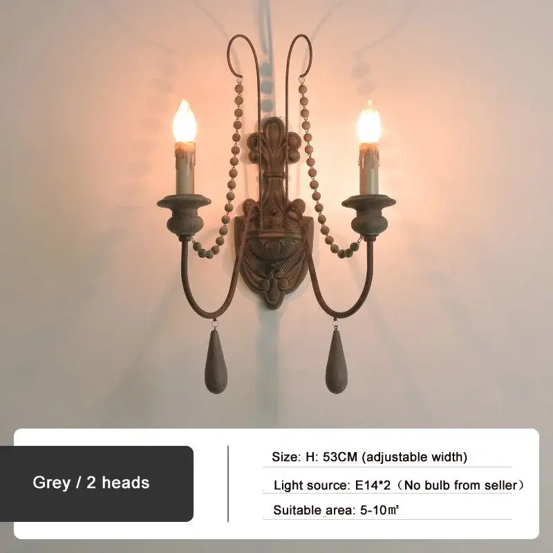 Antique country french wall lamp in grey metal with two candle arms and beaded chain pendants for living room decorbites country french wall