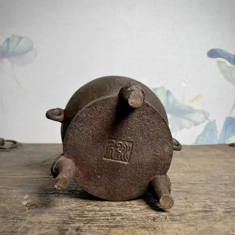 Dark brown cast iron tripod incense burner with small handles for antique double dragon copper craft carbon stove use