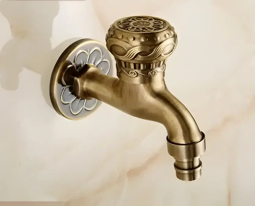 Antique brass single cold tap garden faucet with decorbites dragon carved floral and scrollwork detailing on handle and base