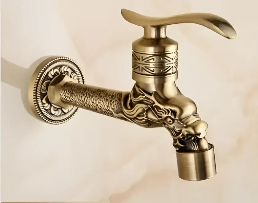 Antique brass single cold tap garden faucet with decorbites dragon carved dragon head and intricate engraved patterns
