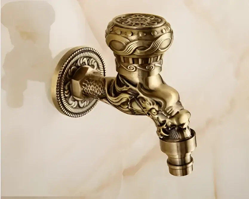 Antique brass decorbites dragon carved single cold tap garden faucet with ornate dragon head and scrollwork detailing