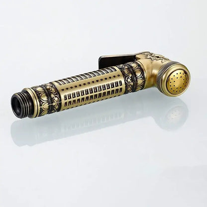 Antique engraved brass bidet shattaf with intricate floral embossing and adjustable bracket for bathroom hygienic washing