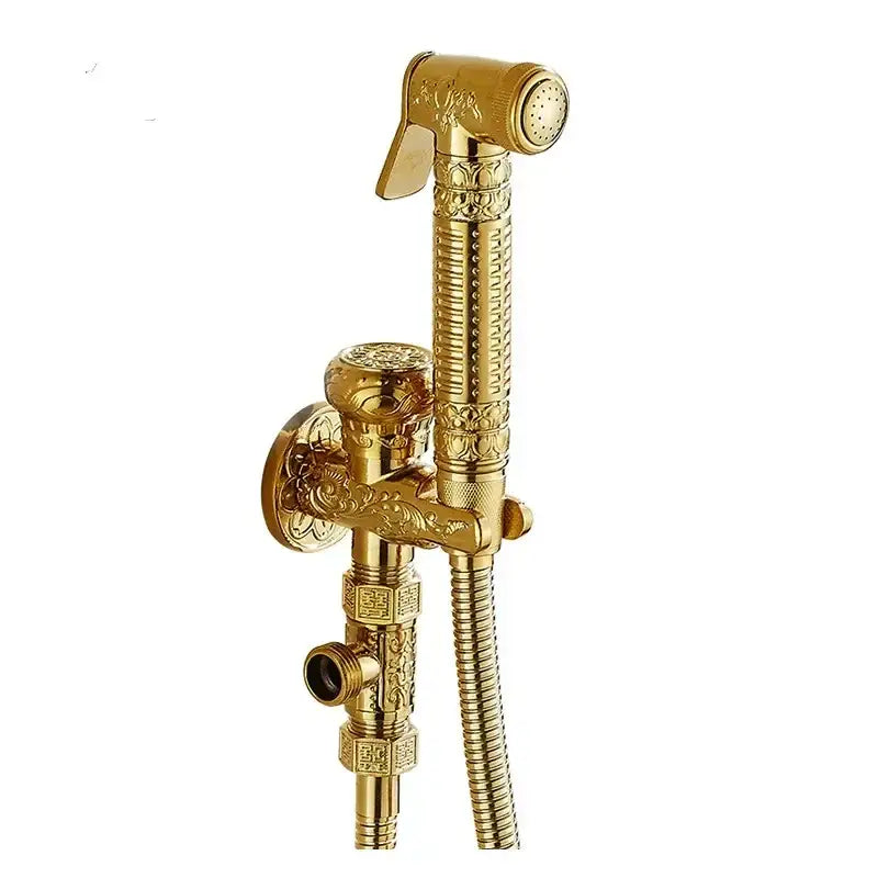 Gold-colored brass bidet shattaf with ornate engraving and textured hose for bathroom hygienic washing by decorbites brass bidet