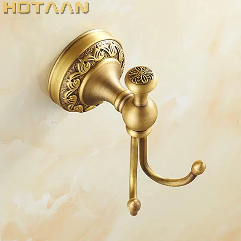 Antique floral brass robe hook with ornate engraving and curved hook in antique finish for bathroom decorbites brass robe use