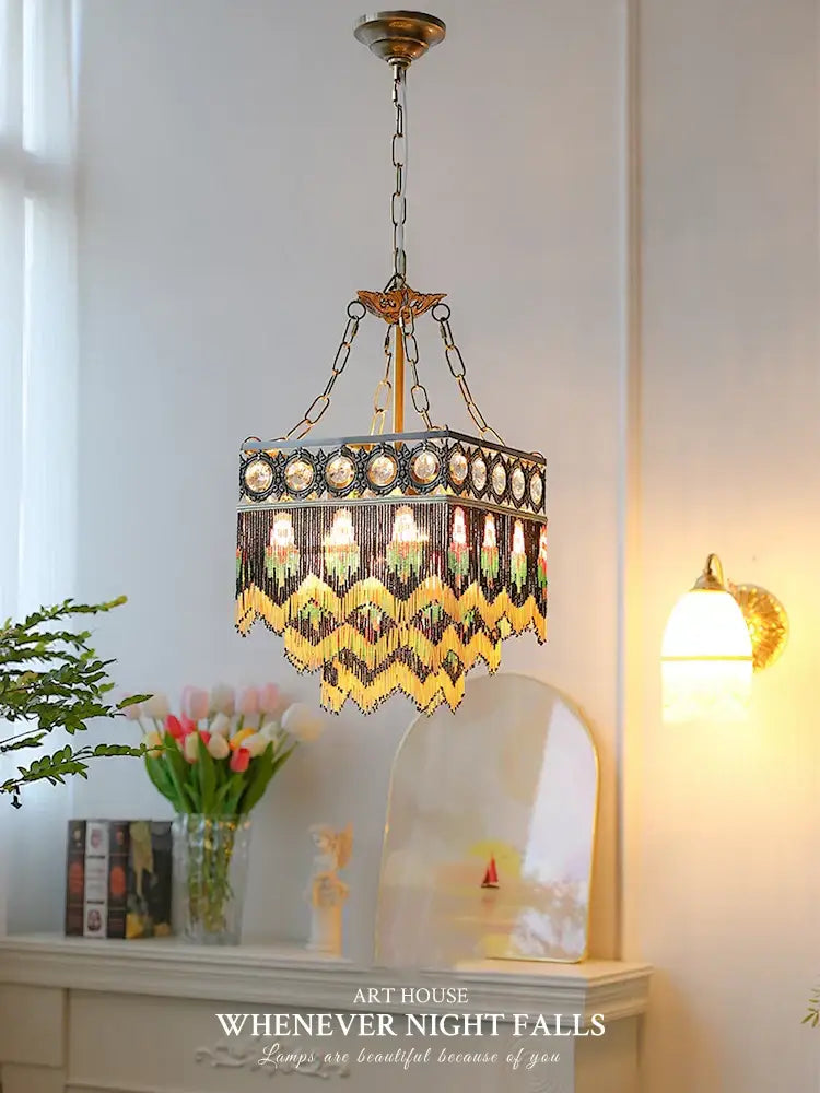 Antique french brass crystal chandelier with brass crystal frame amber green glass panels and yellow tassel fringe decorbites french brass