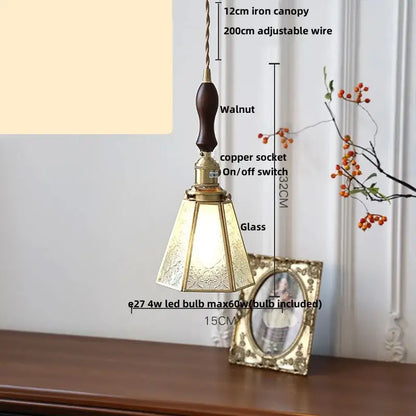 Antique gold petal glass led pendant lamp with walnut wood handle and brass accents featuring ornate etched shade