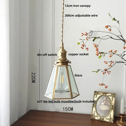 Antique brass-finished pendant lamp with clear glass led panels and visible bulb for kitchen lighting fixture