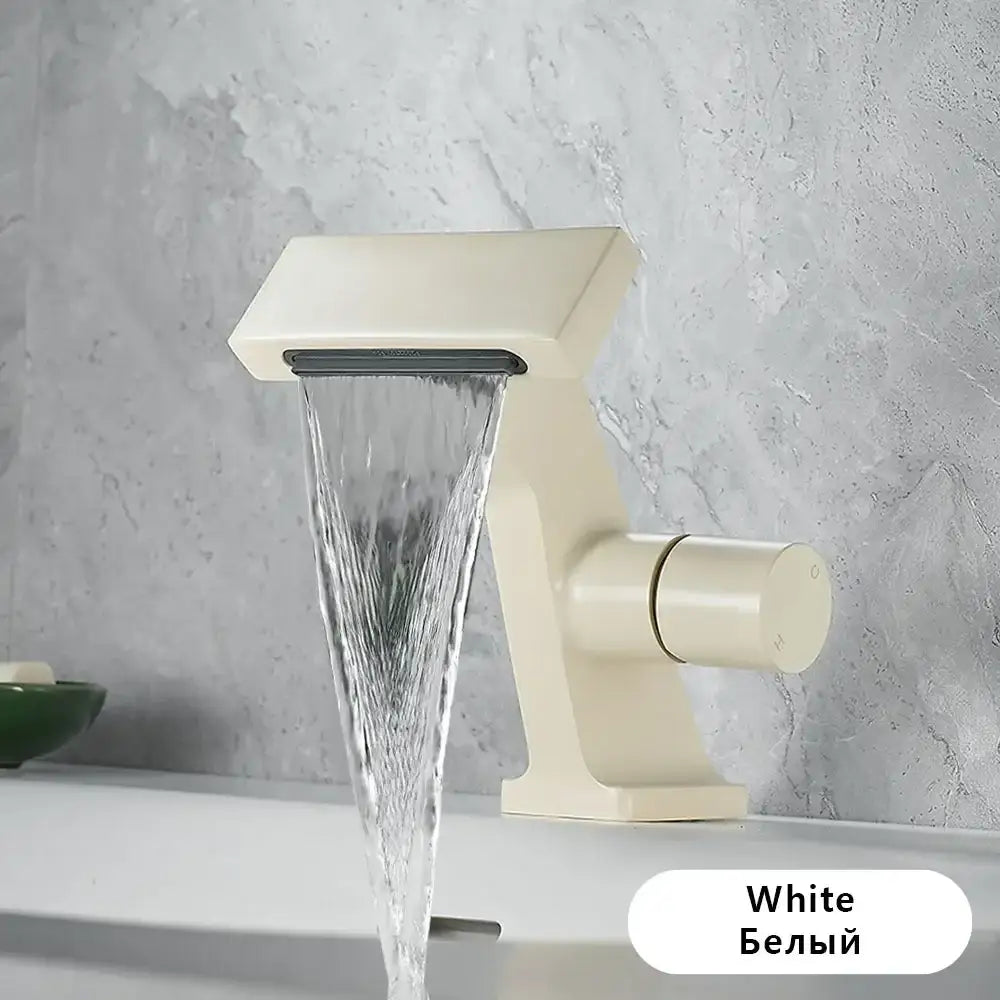 Cream-colored single hole bathroom faucet with sleek modern design matte finish and antique gold waterfall anti-splash spout