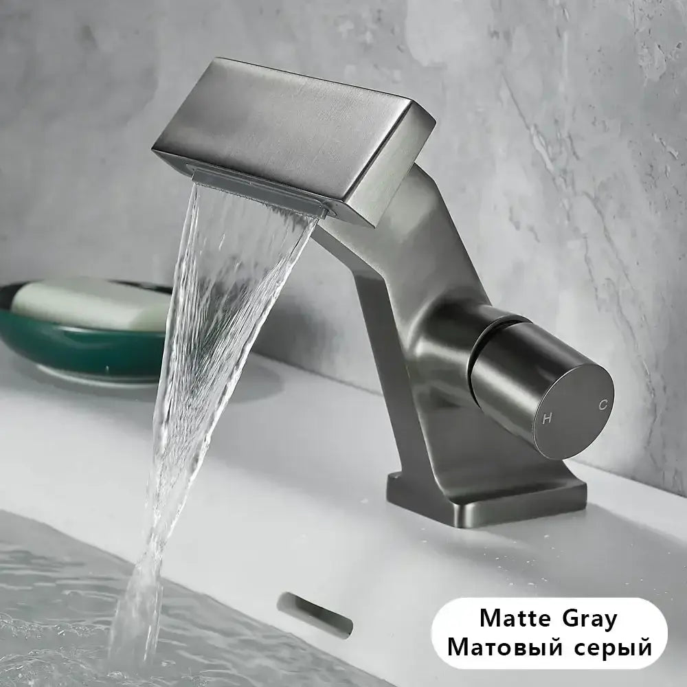 Matte gray modern single hole waterfall faucet with sleek rectangular spout and cylindrical handle for bathroom use