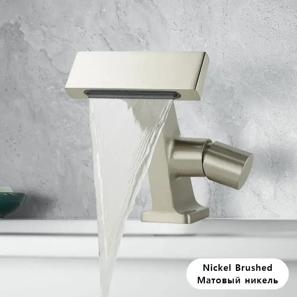 Antique gold single hole bathroom faucet with nickel brushed waterfall spout and sleek rectangular anti-splash design
