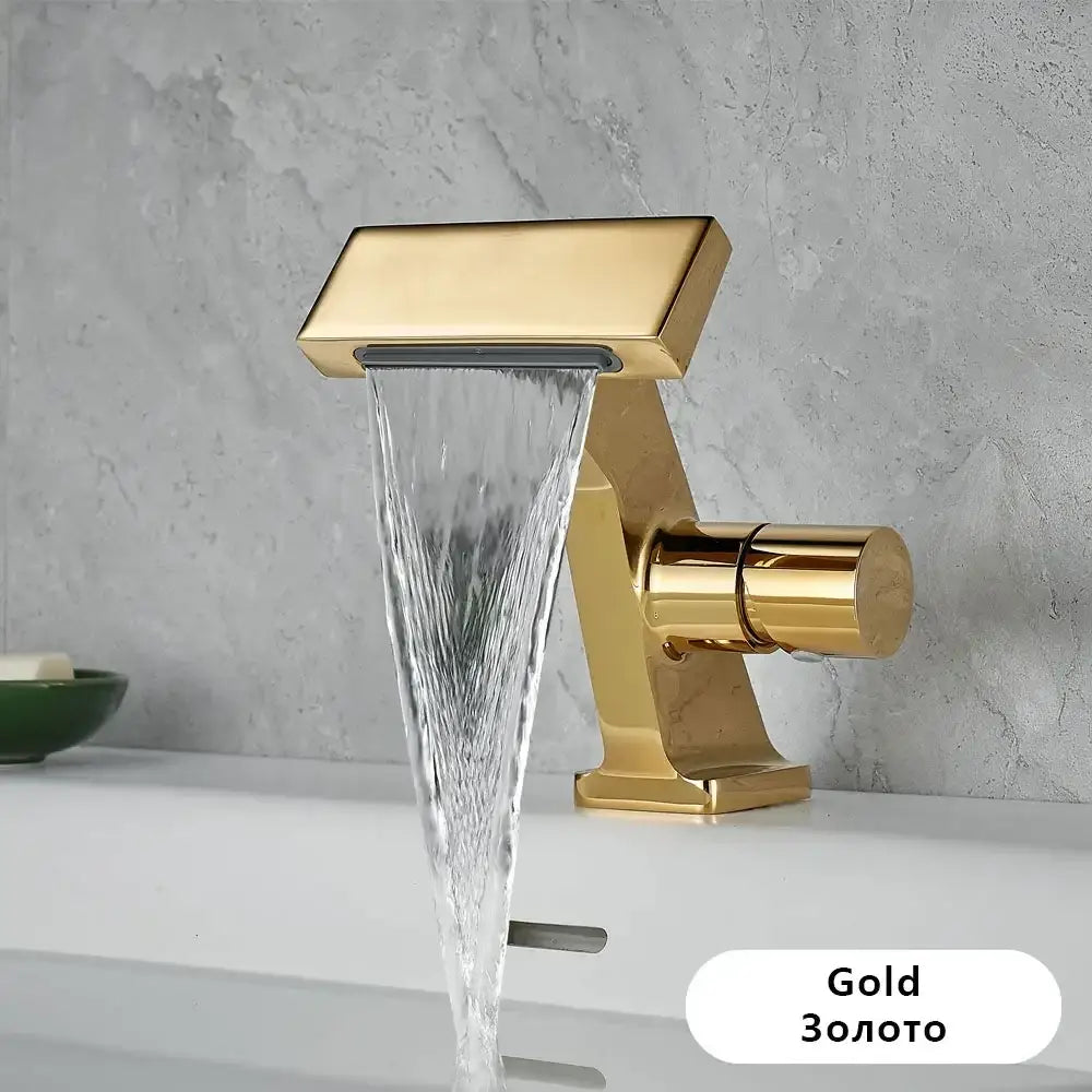 Antique gold waterfall single hole bathroom faucet with sleek modern design and polished metallic finish