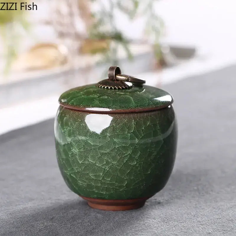 Antique green ceramic tea caddy with ice cracked texture glaze and bronze lid for kitchen storage jar
