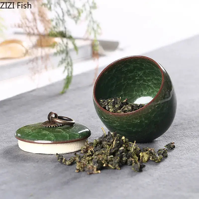 Antique green ceramic tea caddy with ice cracked texture glaze and bronze ring handle for kitchen storage jar