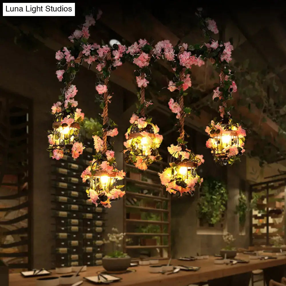 Decorbites antique metal island ceiling light with 5 light pink cherry blossom heads and ornate cage design