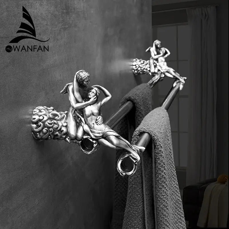 Silver-toned ornate brass double towel bars featuring sculptural embracing couple and intricate mounting base details
