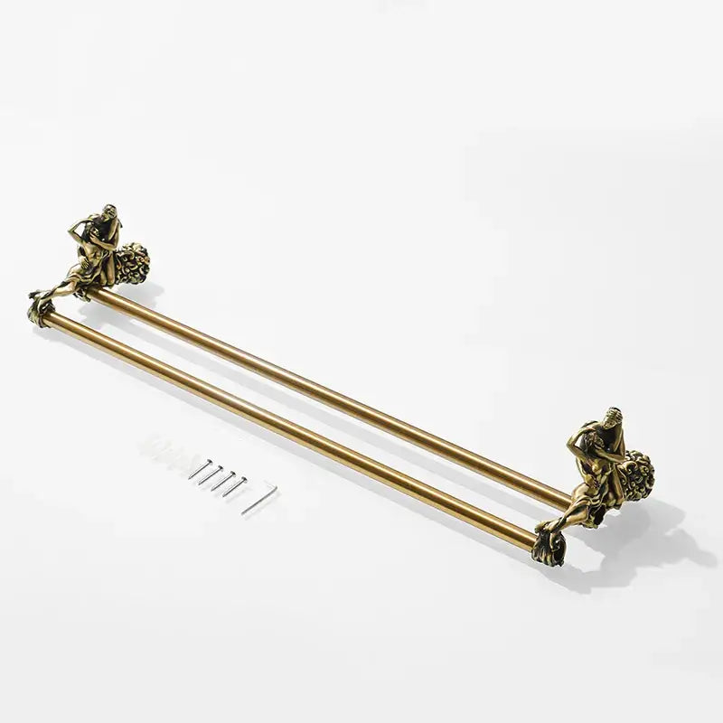 Antique ornate gold and silver brass double towel bars with sculpted figures at each end for bathroom use