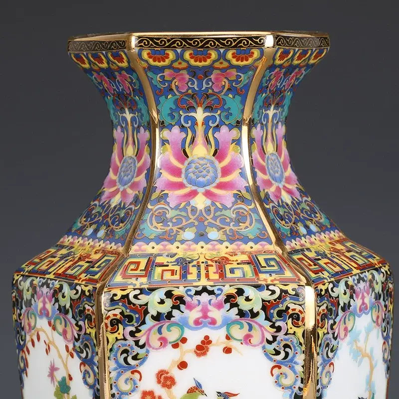 Antique porcelain vase with hexagonal shape, colorful floral and bird enamel paintings, and gold trim in vase collection