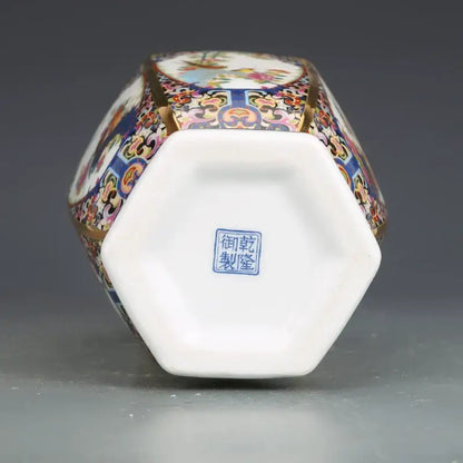 Hexagonal porcelain vase from antique porcelain vase collection with colorful enamel paintings and gold trim