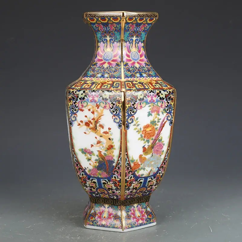 Antique porcelain vase collection featuring a hexagonal porcelain vase with vibrant enamel bird and flower paintings and gold detailing