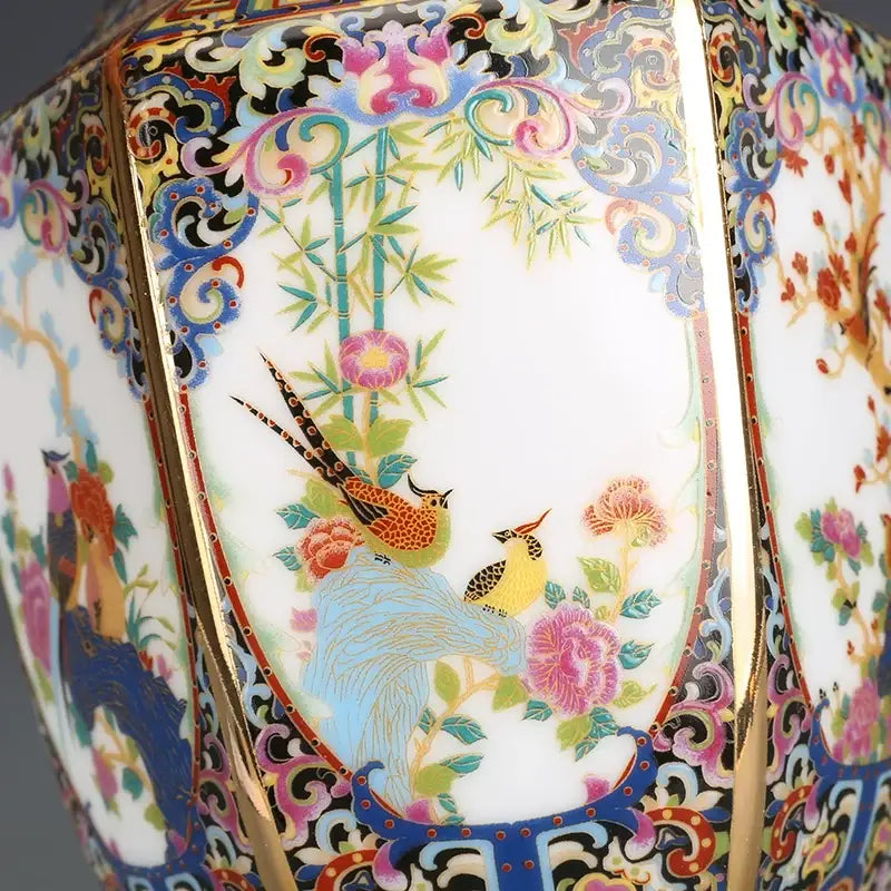 A vibrant ornate porcelain vase featuring hand-painted birds and flowers in a traditional chinese style from a porcelain vase collection