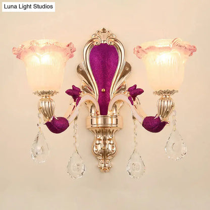 Antique purple and gold double head mount light fixture with pink glass shades and crystal pendants for bedroom sconce