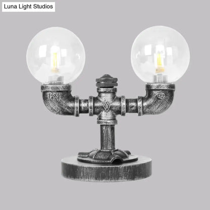 مصباح مكتبي صناعي دائري عتيق باللون الفضي/البرونزي - إضاءة عمل زجاجية شفافة/كهرمانية بقاعدة، مكون من 2/3 لمبات