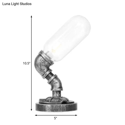 Lámpara de escritorio industrial plateada antigua con pantalla de cristal transparente/ámbar y brazo curvo