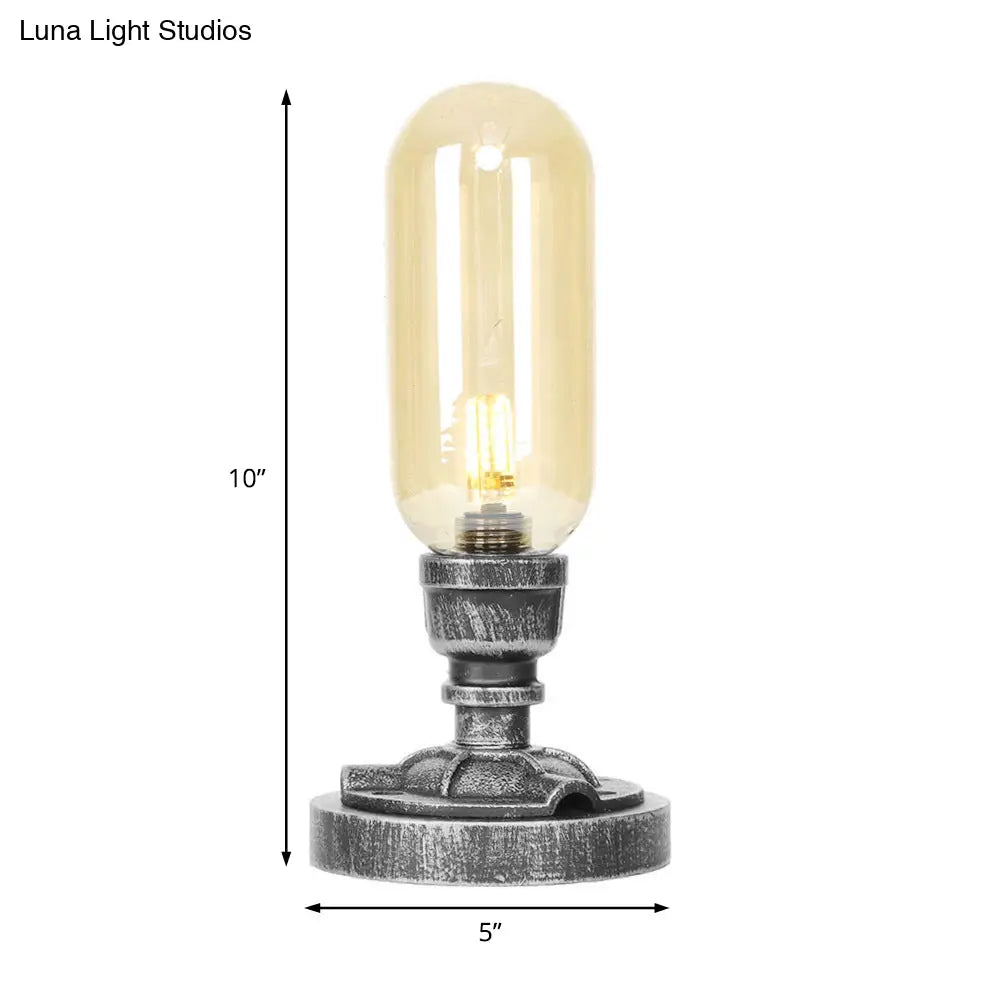 Lámpara de escritorio industrial plateada antigua con pantalla de cristal transparente/ámbar y brazo curvo