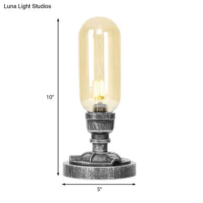 Lámpara de escritorio industrial plateada antigua con pantalla de cristal transparente/ámbar y brazo curvo