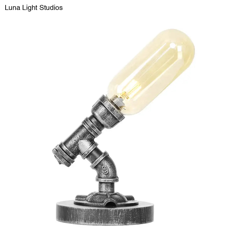 Lámpara de escritorio industrial plateada antigua con pantalla de cristal transparente/ámbar y brazo curvo