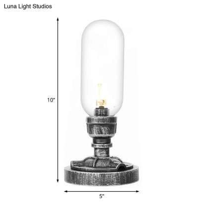 Lámpara de escritorio industrial plateada antigua con pantalla de cristal transparente/ámbar y brazo curvo