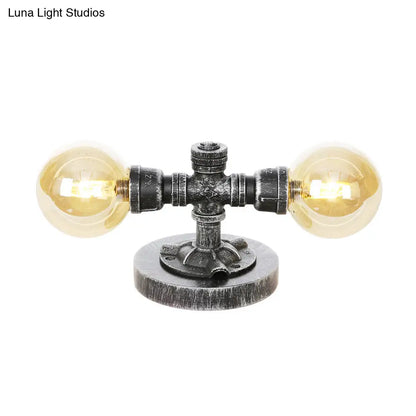 Lámpara de mesa redonda de plata antigua con pantalla de cristal transparente/ámbar - Estilo industrial, 2 luces y base robusta