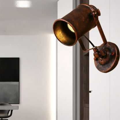 Aplique de pared cilíndrico de estilo antiguo con acabado metálico y soporte de pared en negro/óxido para salas de estar