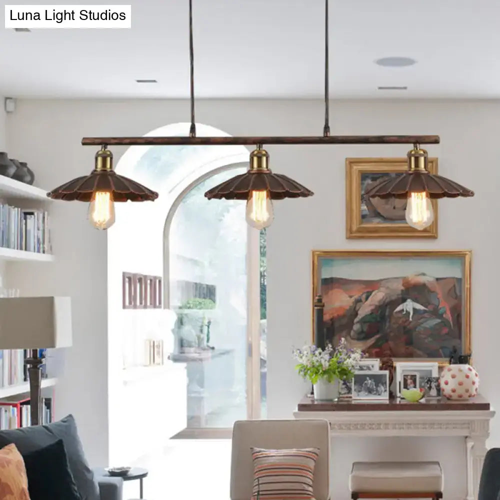 Industrial-style three-light pendant fixture with dark bronze metal frame and 110v-120v edison bulbs for dining table