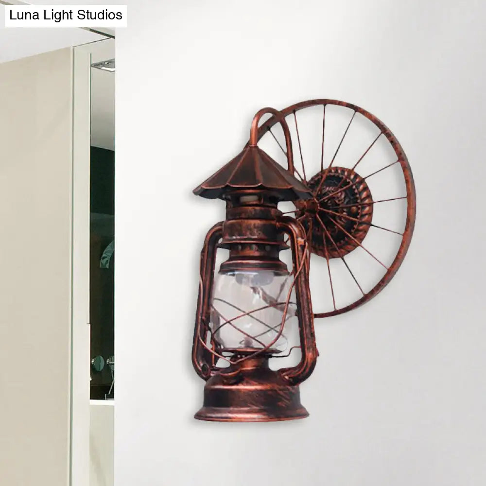 Aplique de pared tipo farol de estilo antiguo y elegante con acabado en negro/bronce – Lámpara de pared de hierro forjado con decoración de rueda.

 (Nota: El título se ha acortado conservando los elementos descriptivos clave y optimizándolo para SEO).