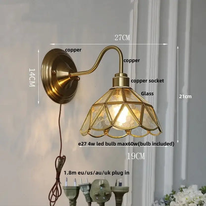 Antique brass wall light fixture with faceted teal glass shade for bedroom wall light decor