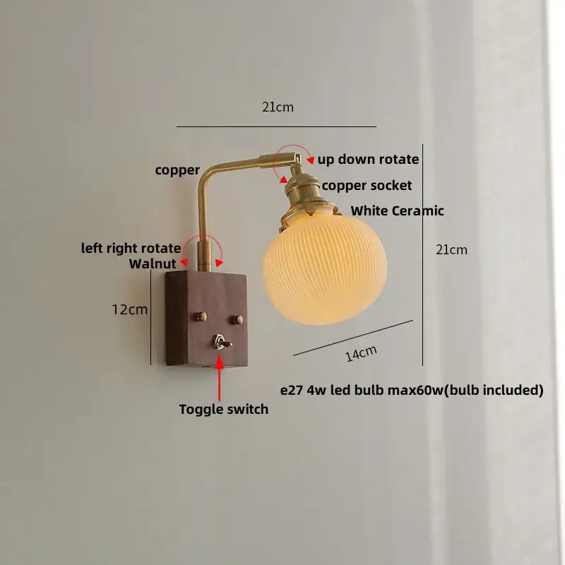 Antique walnut and brass wall light with clear glass globe shade and walnut finished mount with toggle switch by decorbites clear glass