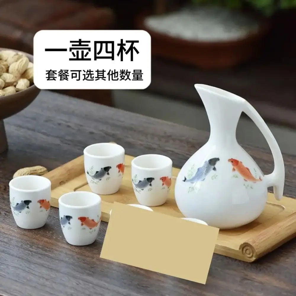 Antique white ceramic warming container set with pitcher and cups featuring hand-painted koi fish decorbites ceramic wine