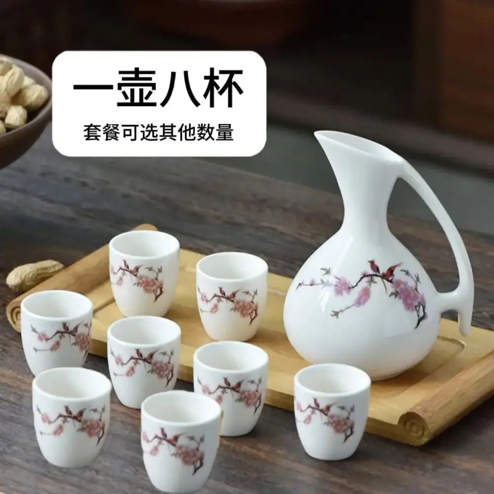 Antique white ceramic warming container set with delicate pink cherry blossom and bird motifs for decorbites ceramic wine use