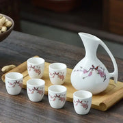 Antique white ceramic warming container set with pink cherry blossom and bird motifs decorbites ceramic wine pot