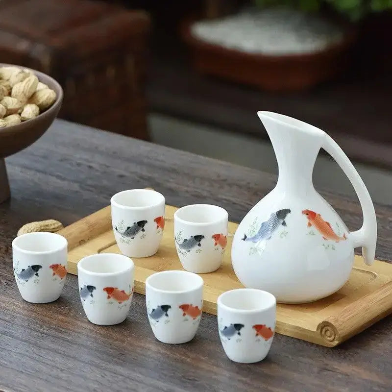 Antique white ceramic warming container set with hand-painted koi fish pitcher and six cups decorbites ceramic wine