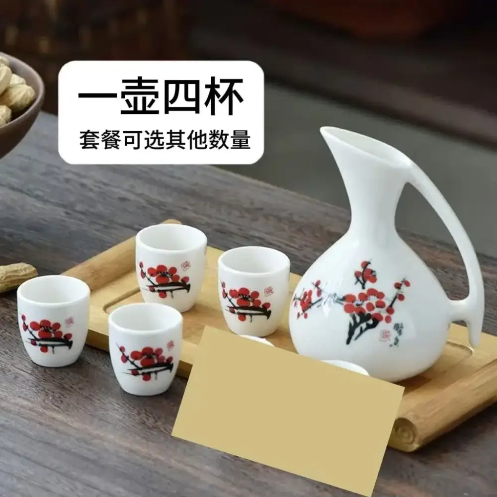 Antique white ceramic warming container set with pitcher and four cups decorated with red plum blossom by decorbites ceramic wine